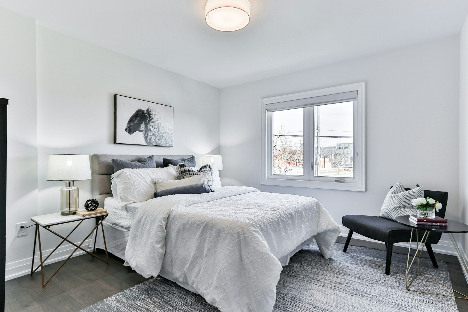 The same great room before renovation, with a low ceiling and a dividing wall